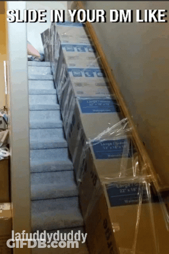 Cardboard Boxes Stacked On Stairs GIF