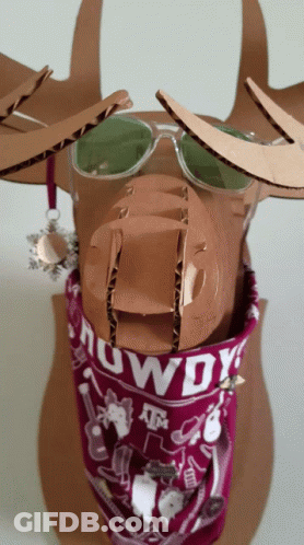 Cardboard Reindeer Wearing Sunglasses And Bandana Saying Rowdy GIF