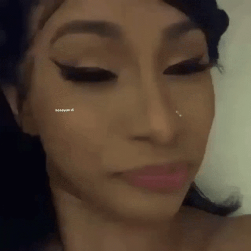 Cardi B Eye Roll Smiling GIF