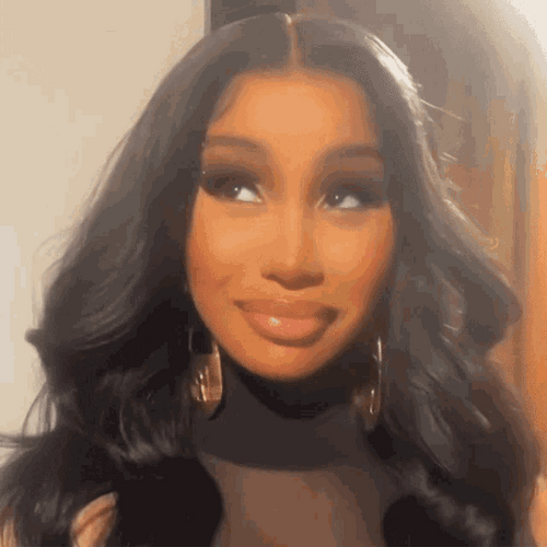 Cardi B Fake Flattered Smile GIF
