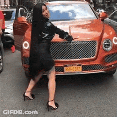 Cardi B Flexing Bentley GIF