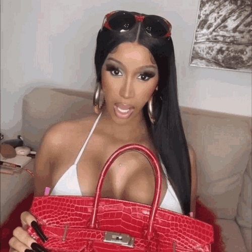 Cardi B Flexing Birkin GIF