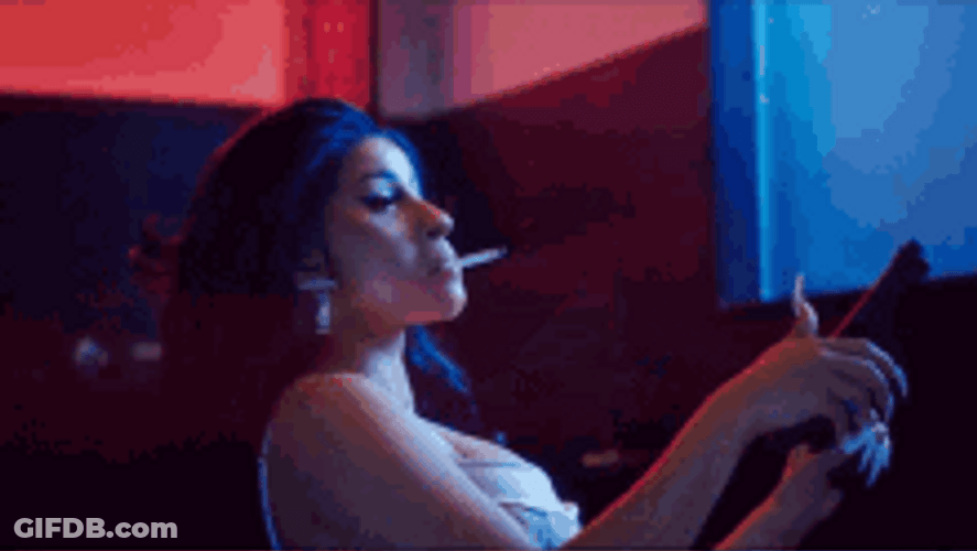 Cardi B Holding A Gun GIF