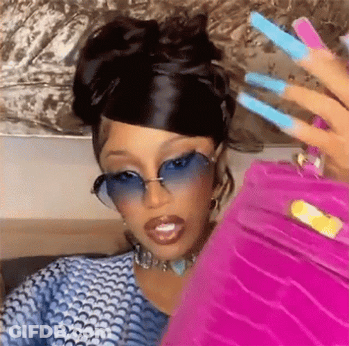 Cardi B Holding Bag GIF