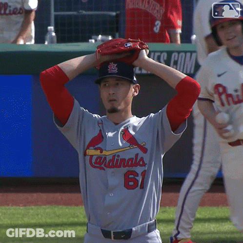 Cardinals Player Holding Glove On Head GIF