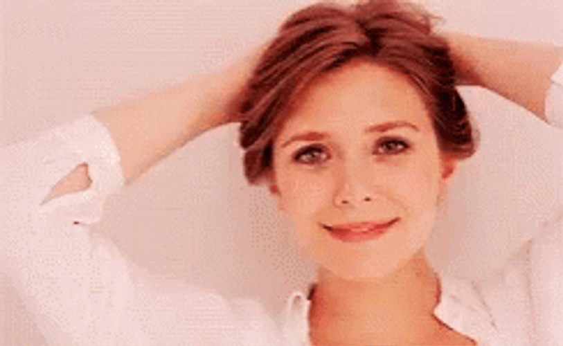 Carefree Elizabeth Olsen Smile GIF