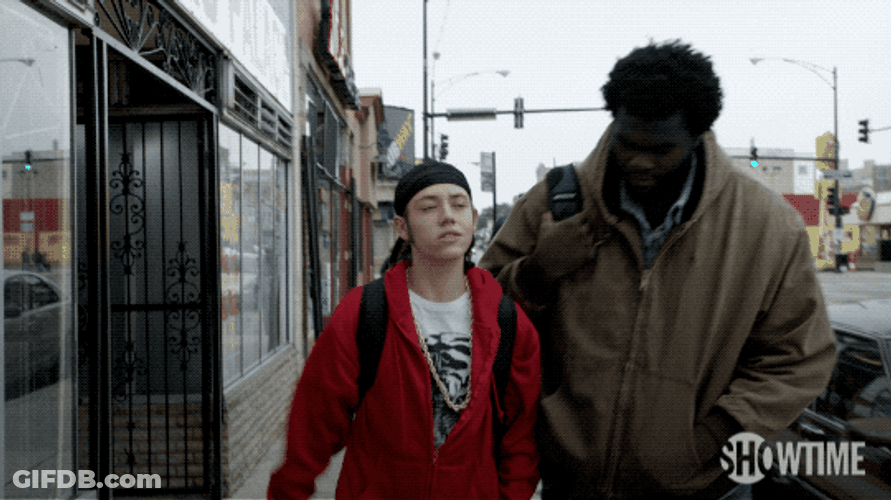 Carl Gallagher Talking To Big Guy Walking GIF
