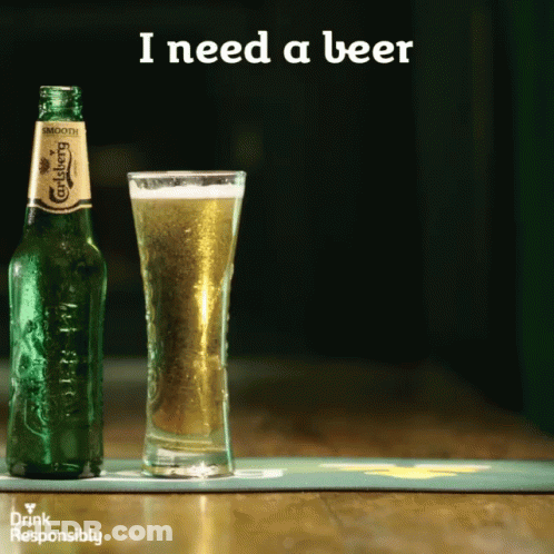 Carlsberg Bottle Next To Full Glass Of Beer GIF