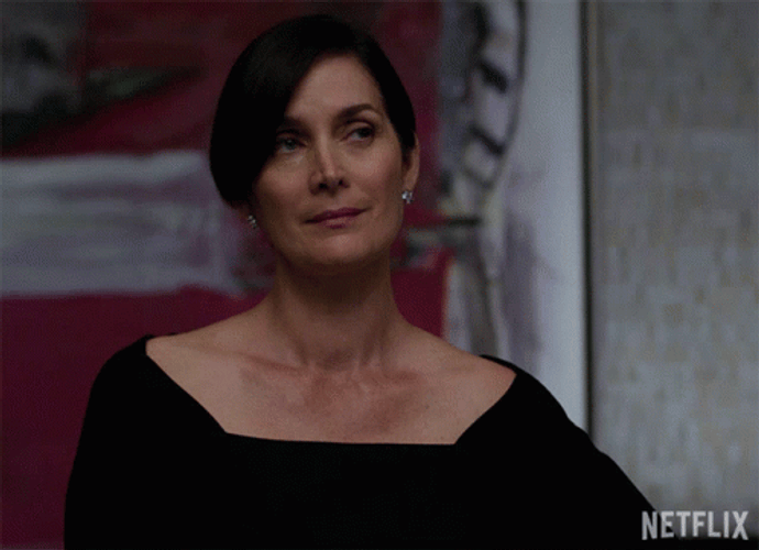Carrie-Anne Moss Smiling Trying Not To Cry GIF