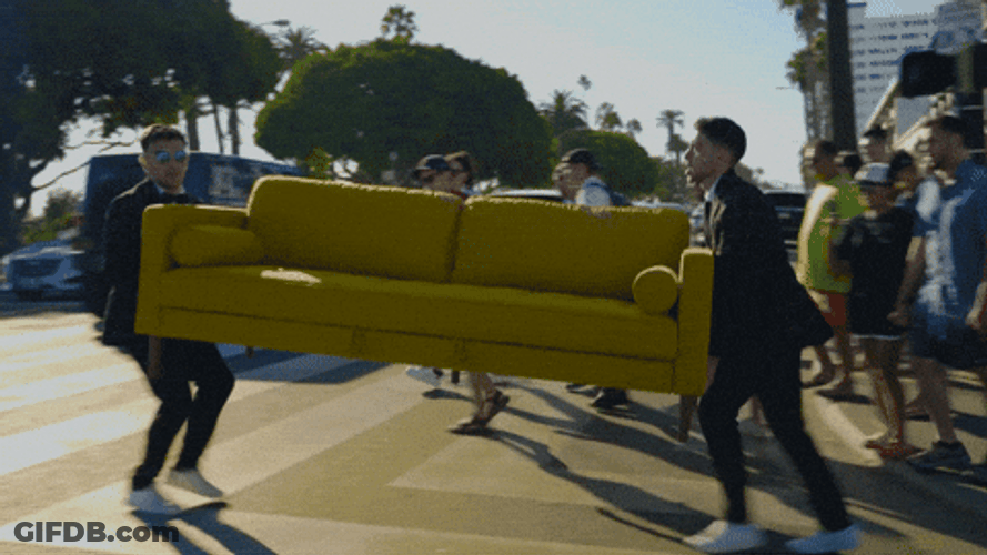 Carrying Yellow Couch Across The Street GIF