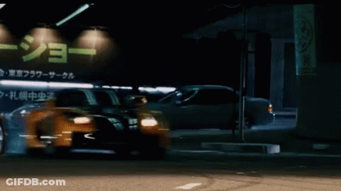 Cars Parked In Front Of Chinese Building GIF