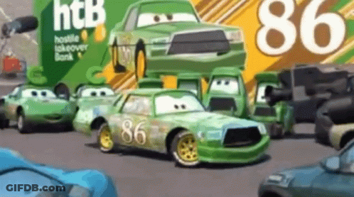 Cars Parked In Front Of HTC Sign GIF