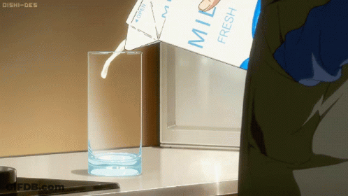 Carton Of Milk Poured Into Glass GIF