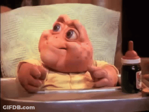 Cartoon Baby In High Chair Next To Medicine Bottle GIF