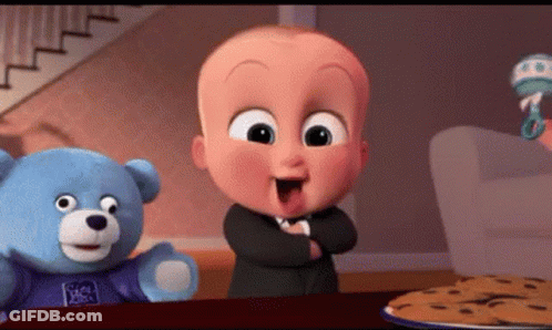 Cartoon Baby Next To Teddy Bear And Cookies GIF