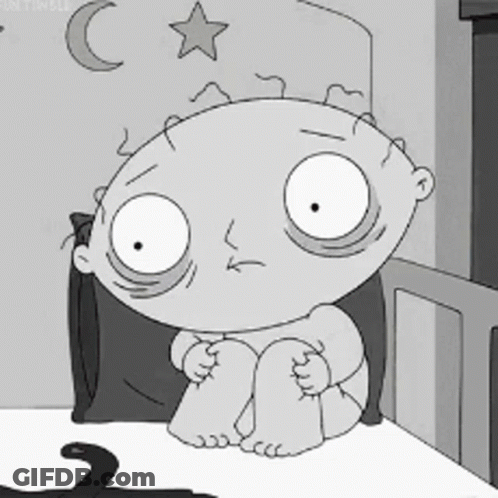 Cartoon Baby Sitting On Bed GIF