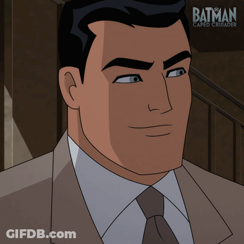 Cartoon Batman Standing On Building Edge GIF