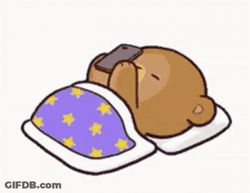 Cartoon Bear Sleeping In Bed With Phone GIF