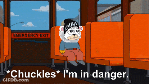 Cartoon Bear Wearing Kimba Hat Sitting GIF
