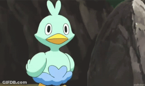 Cartoon Bird With Yellow Beak Standing In Front Of Rock GIF