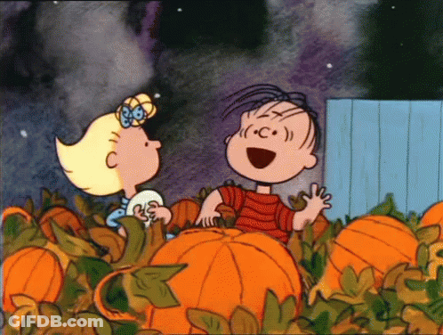 Cartoon Boy And Girl Standing Next To Pumpkins GIF
