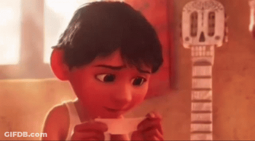 Cartoon Boy Holding Paper In Front Of Guitar GIF