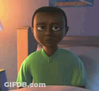 Cartoon Boy In Green Shirt On Bed Looking At Camera GIF