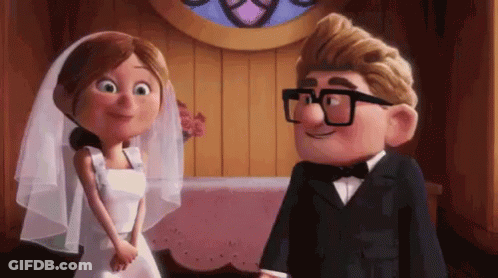Cartoon Bride And Groom Smiling GIF