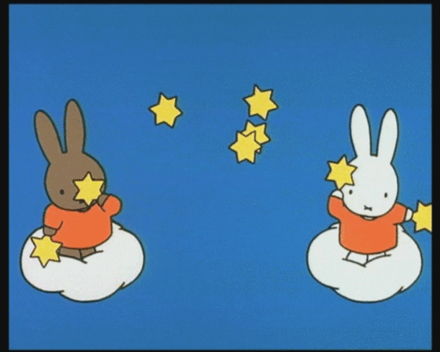 Cartoon Bunnies Juggling Stars GIF