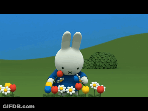 Cartoon Bunny Holding Flowers GIF