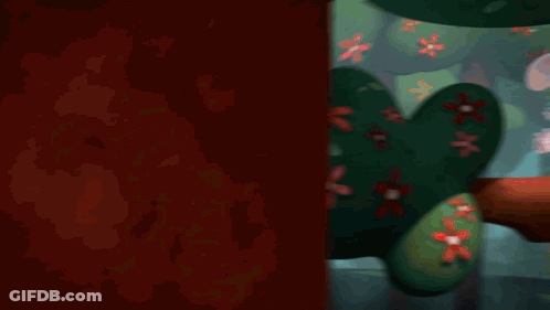 Cartoon Bunny Sitting On Tree Branch With Flowers GIF