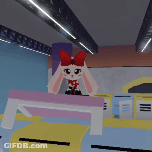 Cartoon Bunny With Red Bow Sitting On Table GIF