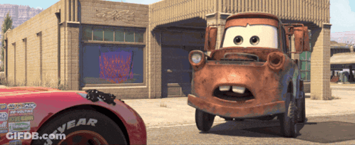 Cartoon Car With Goodyear Tire GIF