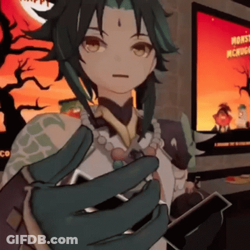 Cartoon Cat At Desk With Monitor And Book GIF