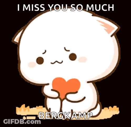 Cartoon Cat Holding Heart Saying I Miss You GIF