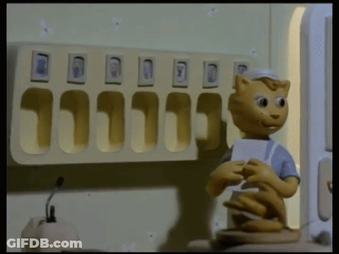 Cartoon Cat Holding Paper In Front Of Shelf With Pictures GIF