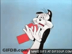 Cartoon Cat Holding Red Object With Make GIF