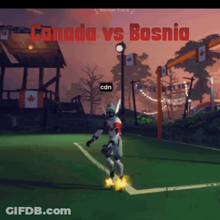 Cartoon Cat In Blue And White On Soccer Field GIF