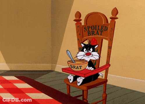 Cartoon Cat In High Chair With Bowl Of Brat GIF