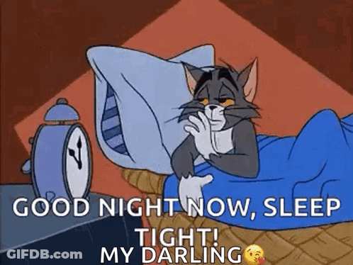 Cartoon Cat Laying In Bed With Alarm Clock GIF