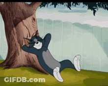 Cartoon Cat Lying Under Tree Hands Behind Head GIF
