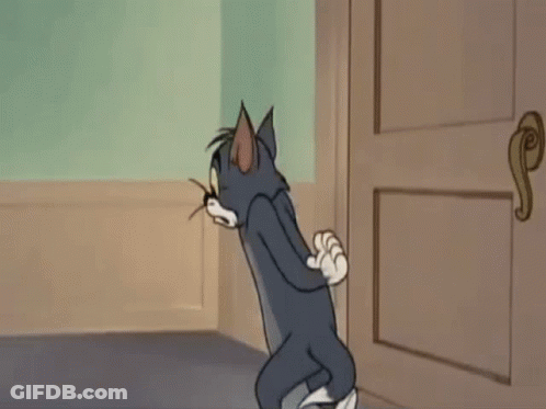 Cartoon Cat Standing In Hallway GIF