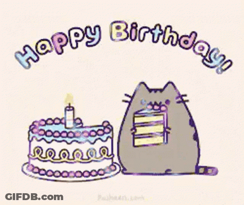 Cartoon Cat Standing Next To Birthday Cake With Candle GIF