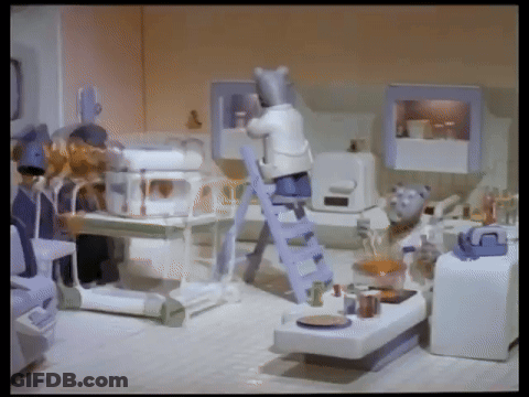 Cartoon Cat Standing On Ladder In Kitchen GIF