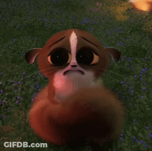 Cartoon Cat With Big Eyes Standing In Grass GIF