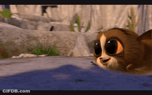 Cartoon Cat With Big Eyes Standing On Rock GIF