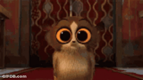 Cartoon Cat With Big Orange Eyes GIF