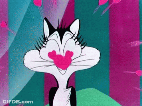 Cartoon Cat With Heart Nose And Pink Heart In Mouth GIF