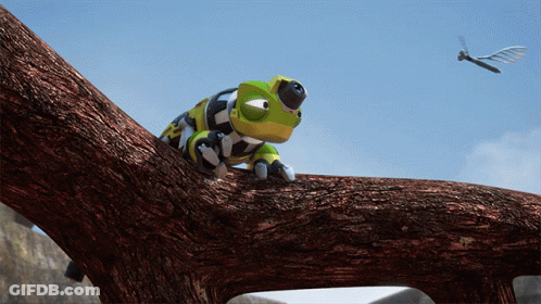 Cartoon Chameleon Sitting On Tree Branch GIF