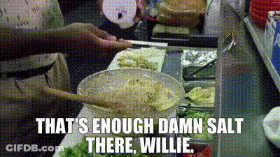Cartoon Character At Table With Fries Saying Needs Salt GIF